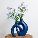 Homezie.de-Gleora - Vervlochten Bloemenvaas - €25-Homezie Vase | Geflochtenes Design | Dekorative Blumenpräsentation